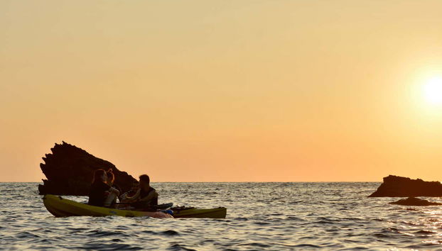 Kayak into the setting sun