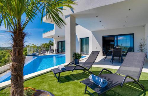 Villa Top Hill, heated infinity pool, Jacuzzi, Sauna, 5 en-suite bedrooms, a Media room - Foto 8