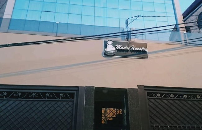 Madre Nuestra - Photo 31