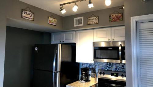 Tropical Getaway w/Private Beach 1 BD Condo - Photo 5, stove, dishwasher, pet friendly, minibar