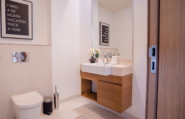 Aya - Impeccable 1BR Apartment with Balcony in City Walk - Photo 30