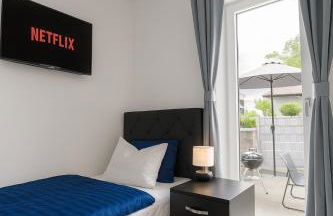 LETA Homes - Komfortables Gästehaus - eigene Parkplätze & Traumterrasse - Foto 1