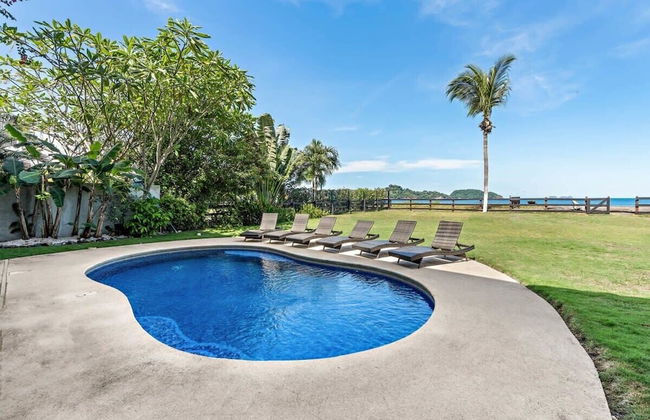 3-Bedroom, 2-Bath Beachfront Condo with Pool - Photo 31