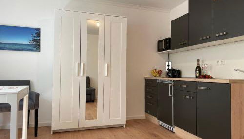 Schöne Souterrainwohnung in Seeshaupt - Foto 5, stove, wardrobe, minibar