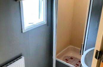 PD Wonderwall Caravan, Direct beach access & Beds made on arrival & GCH - Foto 25