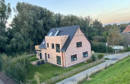 Deichkoje12 Deck 1 EG direkt am Eiderdeich nur 7 km bis zur Nordsee und 20 Min bis Sankt Peter Ording - Foto 28