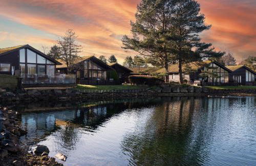 Sandmartin Lodge a lakeshore haven at Pine Lake Resort - Foto 1