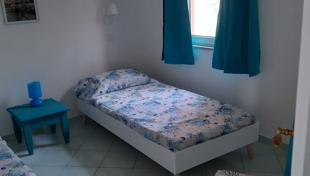 Calarossa Sardinia Apartments - Foto 5, Habitación