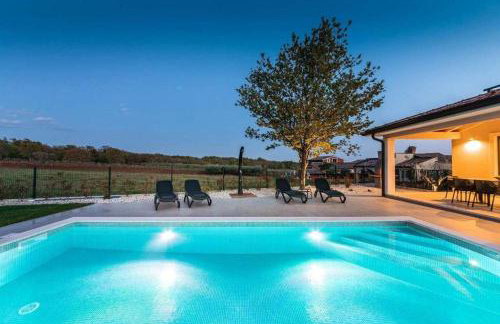 Moderne Villa mit Privatpool, Meerblick, Babybett, BBQ, klimatisierte Schlafzimmer - perfekt zum Biken - Photo 1