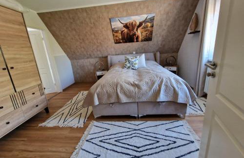 Haus-Fehmarn-am-Dorfteich-|-Wohnung-2-West - Foto 19