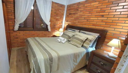 Dúplex 400m do Lago com lareira e garagem - Foto 4