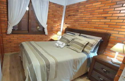 Dúplex 400m do Lago com lareira e garagem - Foto 4