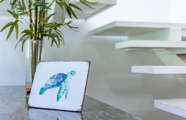 Ultramodern Townhome with an Inviting Coastal Design and Lush Outdoor Oasis with a Private Pool - Photo 32