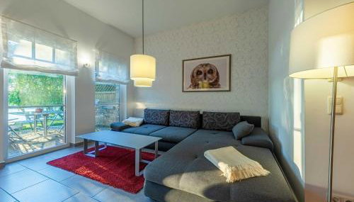 Schwan - Ferienwohnung am Loppiner See mit Terrasse und Sauna - Foto 3