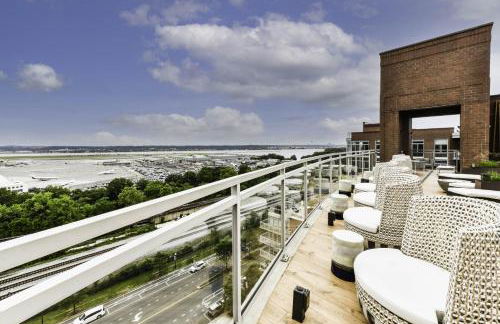 Comfy 2BR Oasis with Scenic Rooftop & Gym - Photo 2