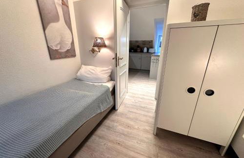 Sky & Sand Homes Strandläufer I Stilvolle Wohnung unter Reet in SPO mit Parkgarten - Photo 13