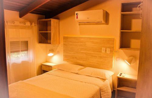 Casa d'Aroeira Residencial Boutique - Centro de Juqueí - Perto de Tudo - 2 quadras do Mar - Serviço de Praia - Roupa de Cama 600 fios algodão Egípcio - Tudo Novo - Estacionamento Interno - Cozinha - Consulte unidades com Ofurô Hidro e Cromoterapia - Foto 71