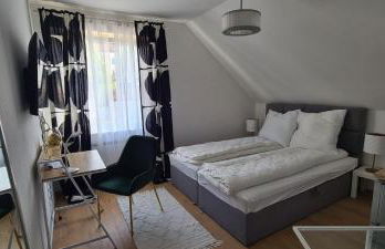 Tim's City Apartments - Foto 16