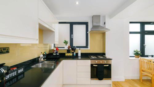 Stylish Hoxton 2 Bedroom 2 Bathroom Apartment Near Shoreditch, Sleeps 6 - Foto 4, stove