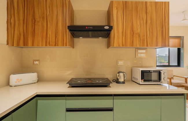 ELIVAAS Kamerios Verano 1 BHK with Pool - Photo 20