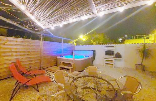 Le 34 degrés sud - 2 chambres - jardinet et jacuzzi - Foto 1