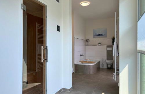 Haus Kiebitz 2 OG - Neubau-Apartment mit Infrarot-Sauna, Balkon & 600 m zum Strand - Foto 10