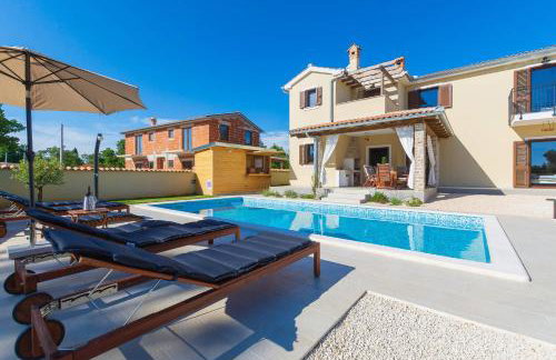 Villa David - luxurious secluded villa with a heated pool - Foto 10