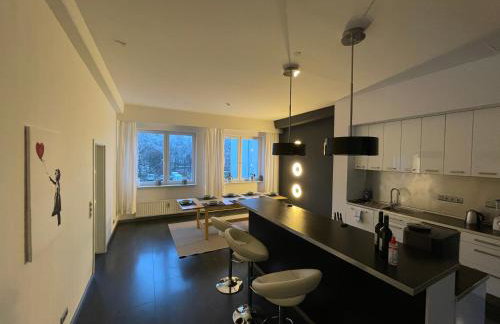 TruRetreats Design Loft für 8 Personen I Riesige Küche I eCharger I 65z SmartTV I 150qm - Foto 18