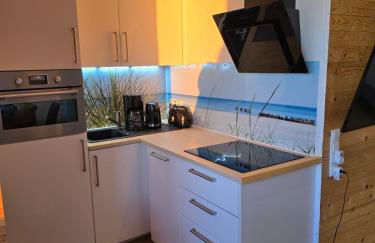 Moderne Wohnung mit Sonnenuntergang über dem Meer - Foto 8