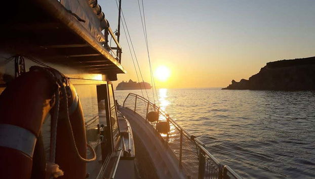 Admire the beautiful sunset from the boat