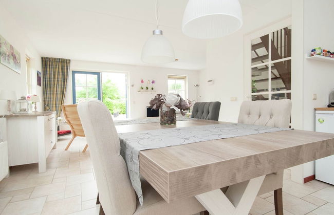 Holiday Home in Schoorl with Fenced Garden near Dunes - Photo 1