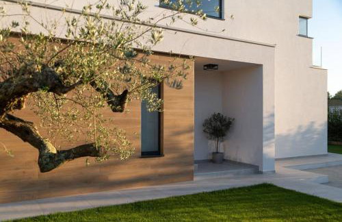 Moderne Luxusvilla Mali Dvor mit Pool 500m am Meer in Porec - Foto 7