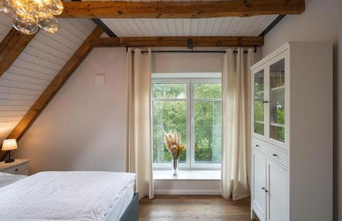 Traumhafte Ferienwohnung am Park, großer Balkon, voll ausgestattete Küche, Schreibtisch, WiFi, Smart TV, Carport, Wallbox, Fahrräder - Foto 17