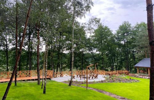 Leśna Kryjówka domki w lesie - Foto 19