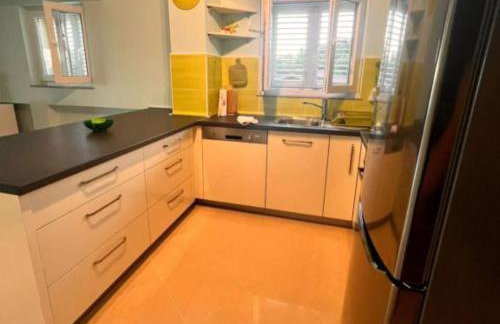 Beachfront Apartment Live - Photo 33