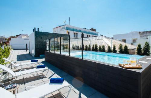 Guadalupe 15 by Magno Apartments - Photo 1