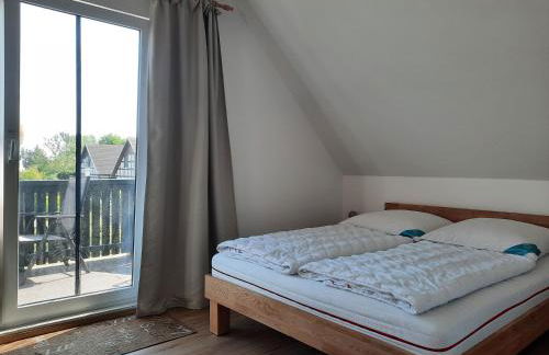 Ferienhaus Sasse Ferienwohnungen mit Garten & Grill - Foto 22