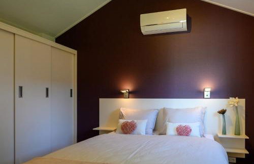 Chalet Charleston 066 mit eigener Terrasse am Wasser - Foto 11