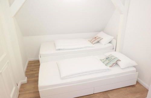 Modernes Ferienhaus mit 4 separaten Appartements, je mit vollausgestatteter Küchenzeile und eigenem Bad, 2 Gehminuten zum Badesee, Garten, Grillplatz, Kinderspielbereich, Hunde sind willkommen - Foto 10