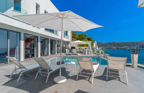 Can Ema, villa moderna con piscina frente al mar - Photo 49