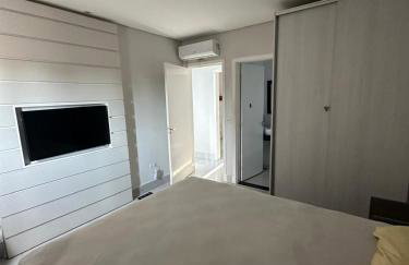 Casa agradável com piscina há 1 quadra da praia. - Foto 6