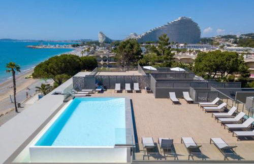 Appartement climatisé les pieds dans l'eau pour 6 personnes avec 1 suite parentale, 1 chambre double et 1 mini chambre Piscine sur le toit clim garage - Foto 5