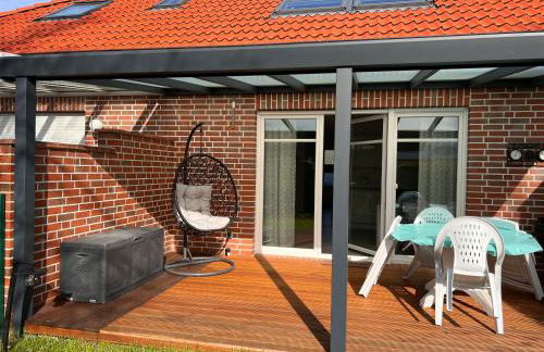 Ostfrieslands Perle Ferienwohnung an der Nordseeküste, Sauna, Terrasse, Garten, ruhige Lage, WLAN - Foto 23