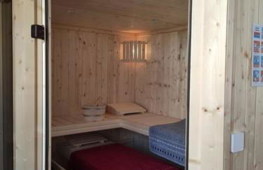 Ferienhaus Blaue Blume mit 11 kW Ladestation, Kamin, Terrasse, eingezäuntem Garten, Sauna, WLAN, Netflix, 2 Hunde willkommen! - Foto 8