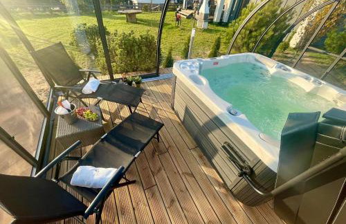 Osada Skoczkowo komfortowe domki z prywatnymi wannami hot-tub nad jeziorem- sauna- balia- prywatny staw wędkarski - Foto 2