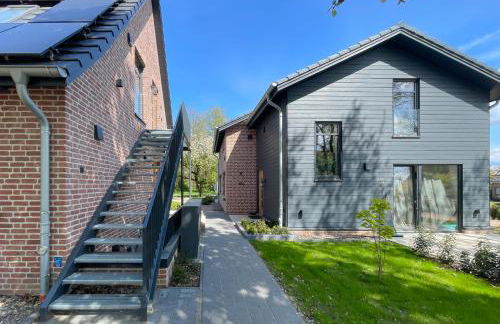 Traumhafte Ferienwohnung am Park, großer Balkon, voll ausgestattete Küche, Schreibtisch, WiFi, Smart TV, Carport, Wallbox, Fahrräder - Foto 55