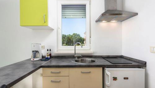 Lichtdurchflutetes Studio-Apartment nur 500 Meter zum Strand mit Grillbereich - Foto 4