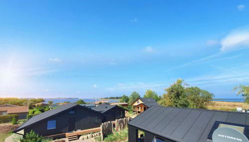 Werder Chalet -- GROßES SONNENDECK -- Strand 150m I Sauna I eKamin I bis 8 Pers I Meerblick I by "Meyers am Meer" - Foto 5, Garden, Garden view