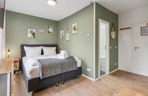 Vorstadtoase - 3 Personen - Apartment mit Queensize-Bett, Badewanne, Schlafcouch, Parken, Netflix, Nähe BER - Foto 9