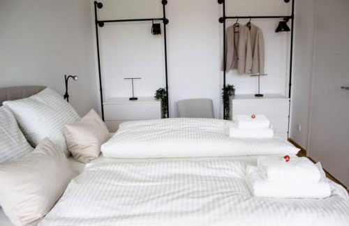 Luxuriöses Neubau-Apartment mit e-Lade Parkplatz - Foto 2